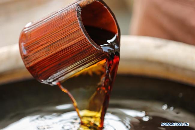 The soy sauce made by Wu Huaqing is shown at his company in Quanzhou, southeast China's Fujian Province, April 29, 2019. [Photo: Xinhua]