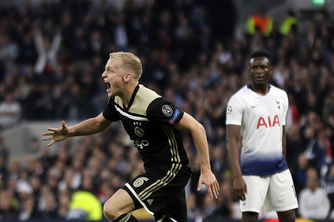 Ajax's Donny van de Beek celebrates after scoring his side's opening goal during the Champions League semifinal first leg soccer match between Tottenham Hotspur and Ajax at the Tottenham Hotspur stadium in London, Tuesday, April 30, 2019. [Photo: AP]