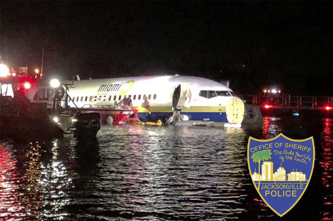 In this photo released by the Jacksonville Sheriff's Office, authorities work at the scene of a plane in the water in Jacksonville, Fla., Friday, May 3, 2019. [Photo: Jacksonville Sheriff's Office via AP]