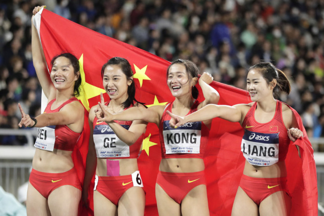 Liang Xiaojing, Wei Yongli, Kong Lingwei and Ge Manqi celebrate after winning silver medal in women's 4x200m at the 2019 IAAF World Relay in Yokohama, Japan, on May 12, 2019. [Photo: IC]