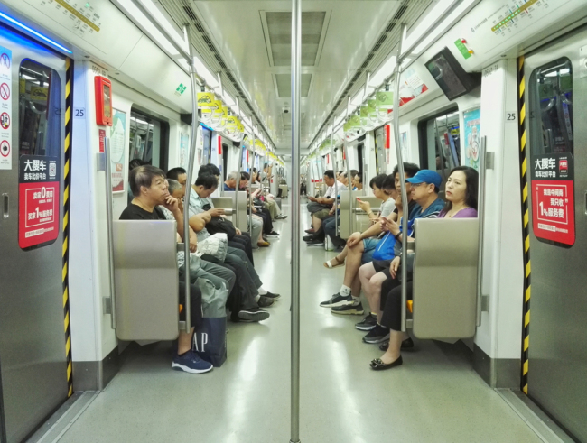 Passengers take a subway train on the Metro Line 6 in Beijing, June 29, 2018. [File photo: IC]<br/><br/>