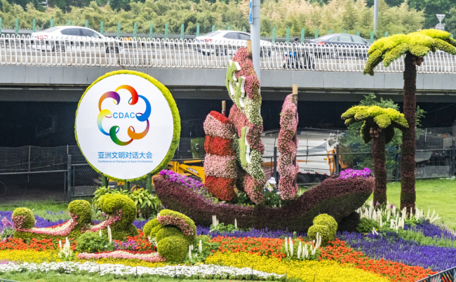 A view of the Conference on Dialogue of Asian Civilizations themed flower garden is showed in downtown Beijing on May 15, 2019. [Photo: IC]