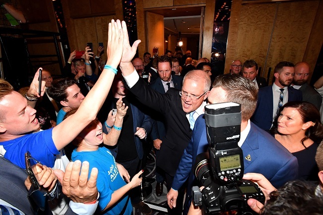 Australian Prime Minister Scott Morrison (C) celebrates with supporters after winning the 2019 Federal Election, at the Federal Liberal Reception at the Sofitel-Wentworth hotel in Sydney, Australia, 18 May, 2019. [Photo: IC]