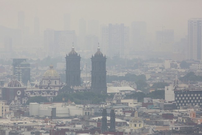 View of air pollution in Puebla, central Mexico, on May 16, 2019. [Photo: AFP/Jose CASTANARES]