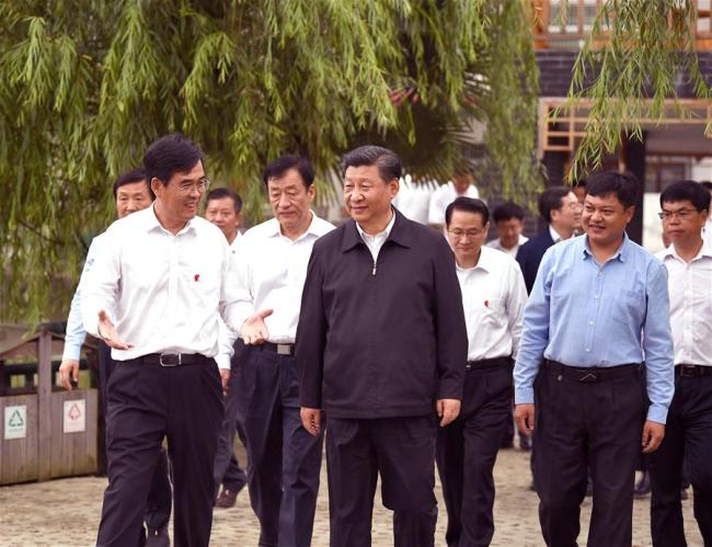 Chinese President Xi Jinping, also general secretary of the Communist Party of China Central Committee and chairman of the Central Military Commission, visits Tantou Village in Yudu County, Ganzhou City, during an inspection tour of east China's Jiangxi Province on May 20, 2019. [Photo: Xinhua/Ju Peng]