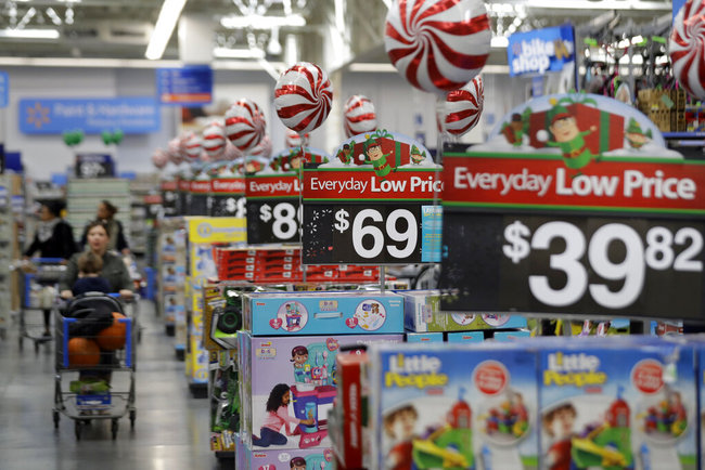  This Oct. 26, 2016, file photo, shows prices in the toy section at Walmart in Teterboro, N.J. An escalating trade war with China could mean higher prices on a broad array of products from toys to clothing. But some retailers will feel more pain than others, further deepening the divide between the winners and the losers that was evident in the latest earnings reports. Analysts say big box giants like Walmart and Target, which have had strong performances, are best positioned to absorb the higher costs because of their clout with suppliers. [Photo: AP]