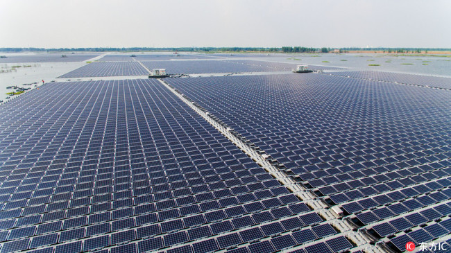 An aerial view of a floating solar energy plant with a capacity of 40 megawatts of energy in Huainan city, east China's Anhui province, June 7, 2017. [File Photo: IC]