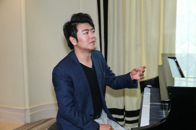 Chinese pianist Lang Lang performs during a promotional event in Shanghai, China on May 11, 2019. [Photo: IC]