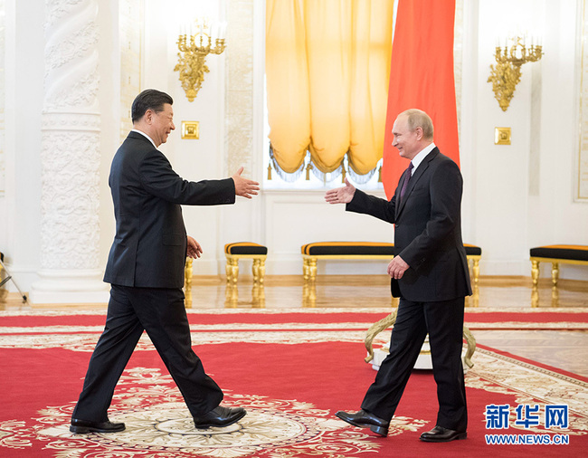 Chinese President Xi Jinping and his Russian counterpart, Vladimir Putin shake hands before their talks in the Kremlin in Moscow on June 5, 2019. [Photo: Xinhua]