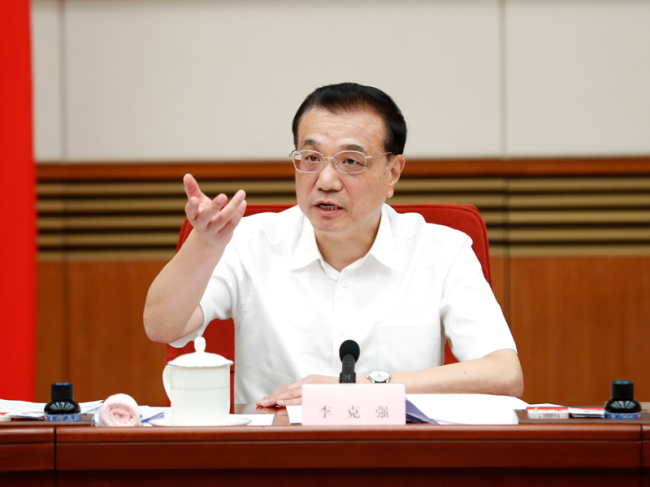 Premier Li Keqiang attends a meeting of the leading group for revitalizing the old industrial bases in the northeastern region on Thursday, June 6, 2019. [Photo: gov.cn]