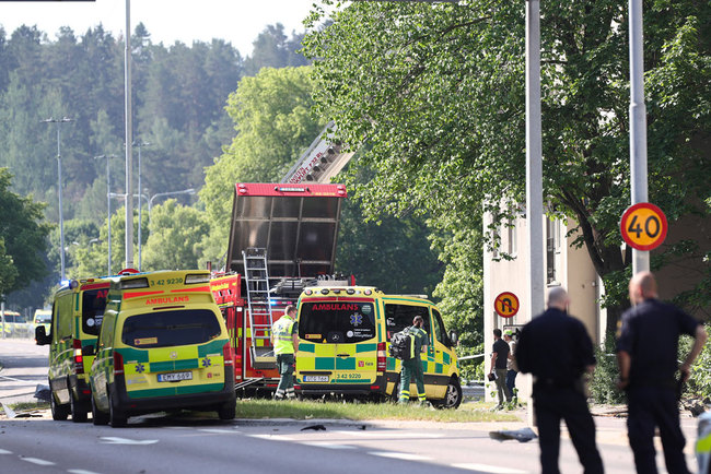 Rescue personnel are seen at the site of an explosion in Linkoping, Sweden June 7, 2019. [Photo: TT News Agency via VCG/Jeppe Gustafsson]