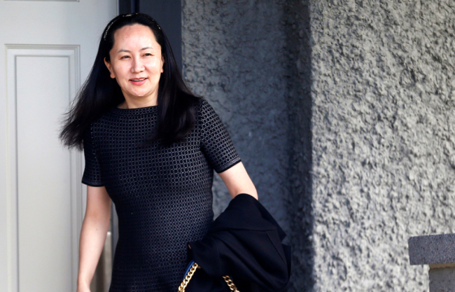 Huawei's Financial Chief Meng Wanzhou leaves her family home in Vancouver, British Columbia, Canada, May 8, 2019. [File photo: VCG]