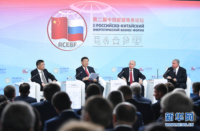 Chinese President Xi Jinping and his Russian counterpart Vladimir Putin attend the second Russian-Chinese Energy Business Forum on Friday, June 7, 2019, in St. Petersburg. [Photo: Xinhua]