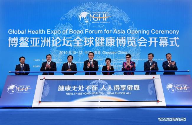Delegates attend the opening ceremony of the Global Health Forum (GHF) of Boao Forum for Asia (BFA) at Qingdao World Expo City in Qingdao, east China's Shandong Province, on June 10, 2019. Themed with "Universal Health Coverage," "Innovation" and "Health in All Policies," the three-day forum will focus on Internet plus healthcare, the industrial transformation of technology innovations, traditional medicine and the development of the health service industry. [Photo: Xinhua/Li Ziheng]