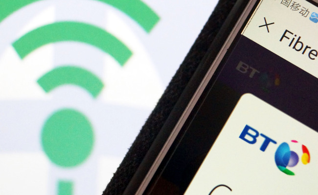 Photo shows the logo of the British multinational BT on a smartphone. In January, BT became the first international telecommunications company to receive a nationwide license to operate in China. [Photo: IC]