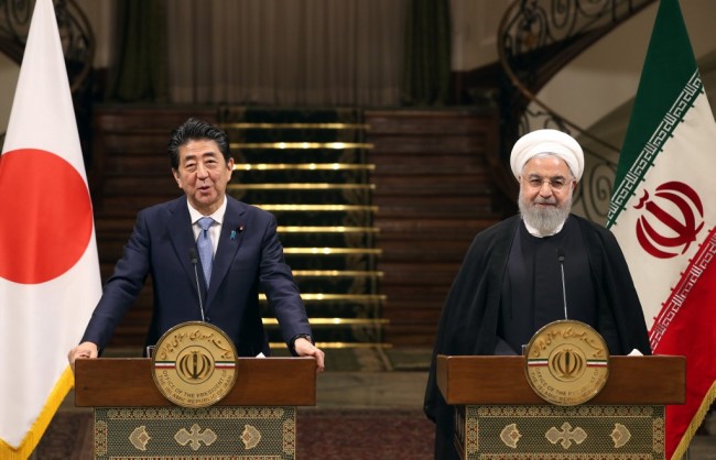 Iranian President Hassan Rouhani (R) and Japanese Prime Minister Shinzo Abe give a joint press conference at the Saadabad Palace in the Iranian capital Tehran on June 12, 2019. [Photo: AFP]