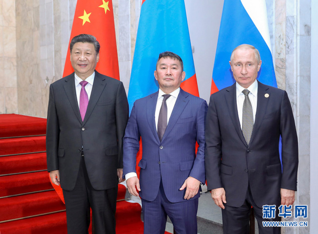 Chinese President Xi Jinping,  Mongolian President Khaltmaa Battulga and Russian President Vladimir Putin meet on the sidelines of the 19th Shanghai Cooperation Organization (SCO) summit, June 14, 2019. [Photo: Xinhua]