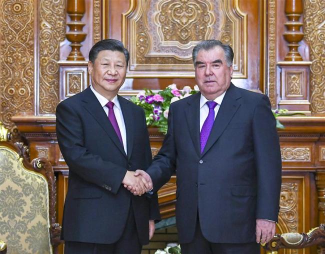 Chinese President Xi Jinping and his Tajik counterpart Emomali Rahmon hold talks in Dushanbe, the capital of Tajikistan, June 16, 2019. [Photo: Xinhua] 