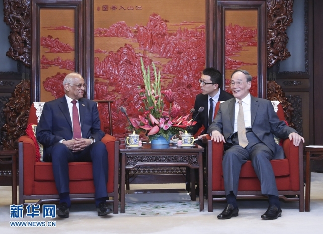 Chinese Vice President Wang Qishan meets with Egypt's Parliament Speaker Ali Abdel-Aal in Beijing on Wednesday, June 19, 2019. [Photo: Xinhua]