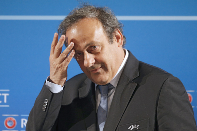 In this Feb 22, 2014 file photo, UEFA President Michel Platini arrives at a press conference, one day prior to the UEFA EURO 2016 qualifying draw in Nice, southeastern France. [Photo: IC]
