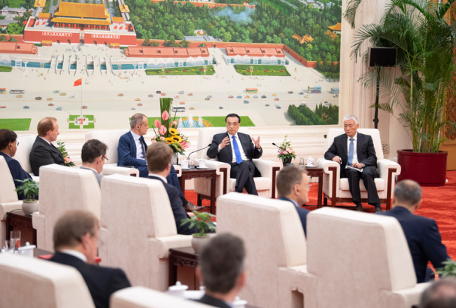 Chinese Premier Li Keqiang meets with executives of a number of famous multinational companies who are in Beijing to attend the seventh round-table summit of the Global CEO Council on Thursday, June 20, 2019. [Photo: gov.cn]