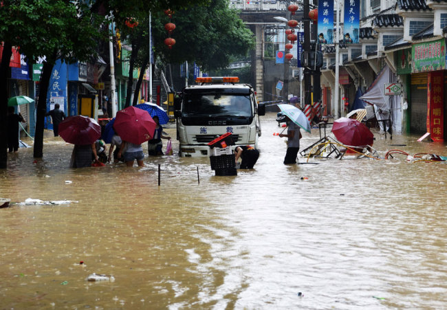 Heavy rain causes flooding in Yanhe Tujia Autonomous County in Guizhou Province on Saturday, June 22, 2019. [Photo: IC]
