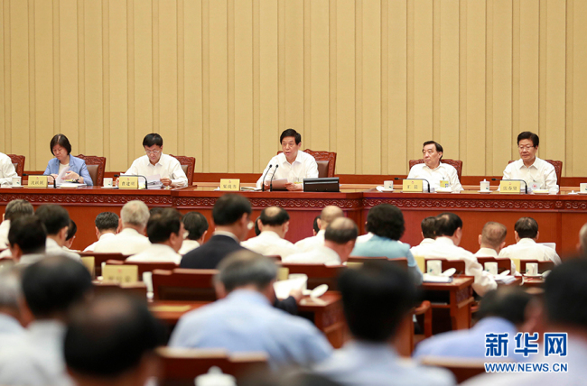 Li Zhanshu, chairman of the Standing Committee of the National People's Congress (NPC), presided over the NPC's bimonthly session, Tuesday morning, in Beijing. [Photo: Xinhua]