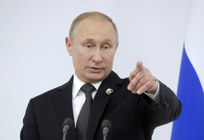 Russia's President Vladimir Putin gives a news conference following the G20 summit, at the INTEX Osaka International Exhibition Centre, in Japan. [Photo: IC]