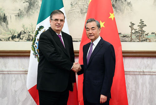 Chinese State Councilor and Foreign Minister Wang Yi (R) meets with visiting Mexican Foreign Minister Marcelo Ebrard in Beijing, on July 2, 2019. [Photo: fmprc]