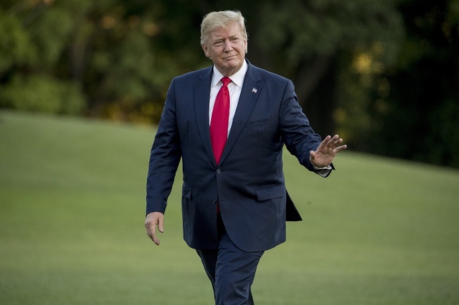 US President Donald Trump walks across the South Lawn as he arrives at the White House, Sunday, June 30, 2019, in Washington. [File Photo: IC]