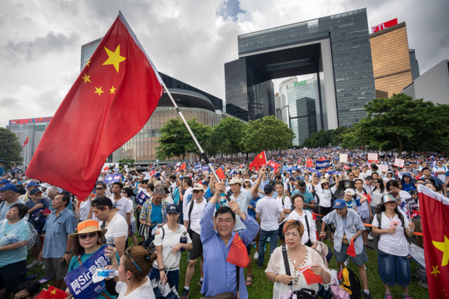 Hong Kong residents rally to show their support to the police for enforcing the law on June 30, 2019. [Photo: IC]