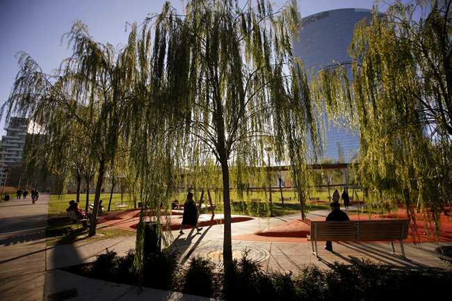 File Photo: In this Dec. 4, 2018 file photo, people walk in Tree Library park in Milan, Italy. [Photo: AP/Luca Bruno]