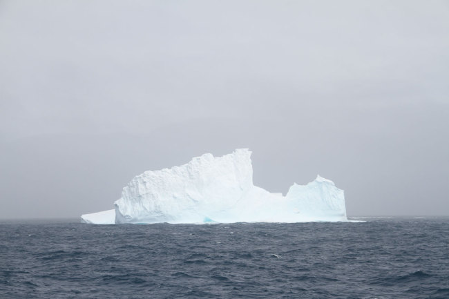 Photo taken on December 5, 2015 shows an iceberg floating in the Antarctic Sea. [Photo: IC]