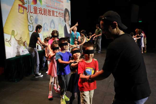 A drama workshop, arranged by the If Kids Theater from Taipei, was held in Beijing on Wednesday, July 17, 2019. [Photo: China Plus]