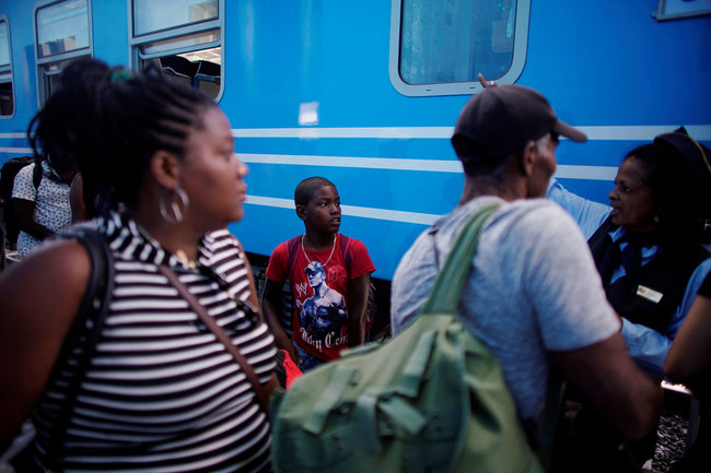 A boy aboard one of Cuba's first Chinese-made train cars at La Coubre train station, Havana, Cuba, July 13, 2019. [Photo: VCG]