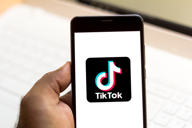The TikTok logo is seen displayed on a smartphone. [Photo: IC]