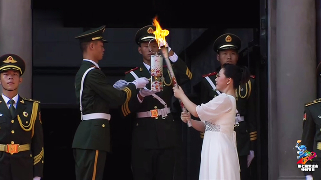 Fang Minglu, great-granddaughter of Chinese military martyr Fang Zhimin, ignited the first torch for the 2019 World Military Games Torch Relay held in Nanchang on Aug 1, 2019. [Photo: CCTV]