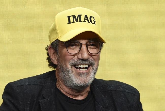 Chuck Lorre, executive producer of the CBS series "Bob Hearts Abishola," wears a hat with initials that he said stand for "Immigrants Make America Great" during a panel discussion on the show at the Summer 2019 Television Critics Association Press Tour at the Beverly Hilton, Thursday, Aug. 1, 2019, in Beverly Hills, Calif. [Photo: AP]