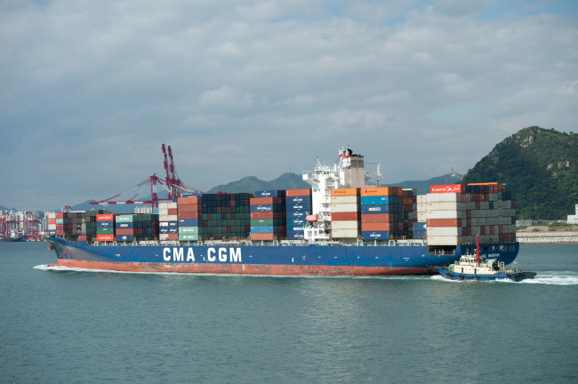 A container ship in the sea, Busan, Yeongnam, South Korea. [File Photo: IC]