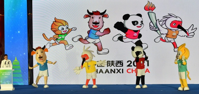 The emblem and mascots of the 14th Chinese National Games are unveiled in Xi'an on Friday, August 2, 2019. [File photo: VCG]