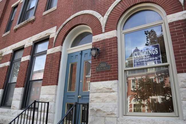 An election sign is seen on the window of U.S. Rep. Elijah Cummings, D-Md., Friday, Aug. 2, 2019, in Baltimore. [Photo: AP]<br>