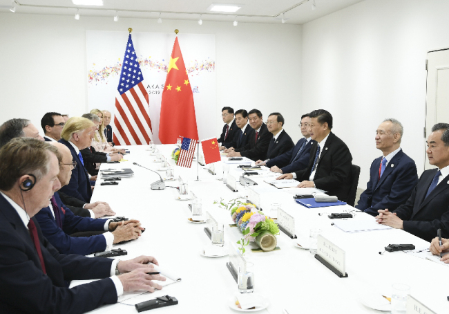 Chinese President Xi Jinping meets with U.S. President Donald Trump in Osaka, Japan, June 29, 2019. [Photo: Xinhua/Xie Huanchi]