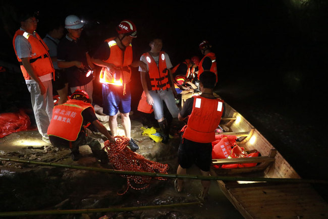 Rescuers work in Duobi Gorge, Hefeng County, Hubei Province after a flash flood caused by downpour on August 4, 2019. [Photo: IC]