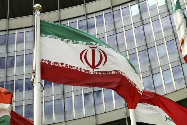 Iranian flags wave outside of the UN building that hosts the International Atomic Energy Agency, IAEA, office inside in Vienna, Austria, on July 10, 2019. [Photo: IC]