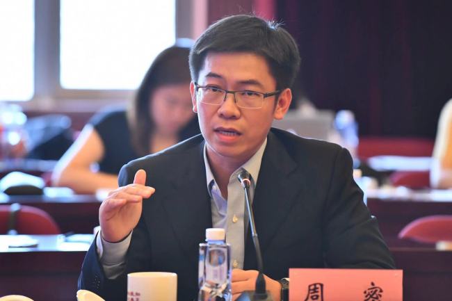 Dr. Zhou Mi, senior research fellow with Chinese Academy of International Trade and Economic Cooperation, gave a speech at a seminar about China-US economic and trade relations in Beijing on Tuesday. [Photo provided by China News Service to China Plus] 
