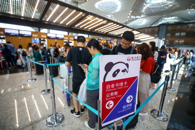 Passengers for the Sichuan Airlines flight from Istanbul to Chengdu flight waiting in line at Istanbul Airport in Turkey on Thursday, August 1, 2019.[File Photo: Anadolu Agency via IC/Muhammed Enes Yildirim] 