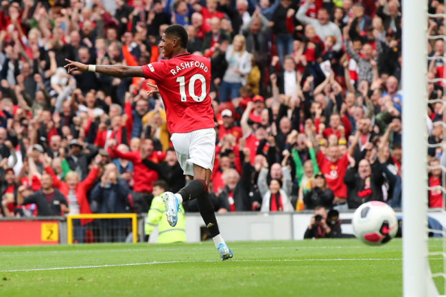 Marcus Rashford of Manchester United celebrates after scoring a goal to make it 3-0 in the Premier League game against Chelsea at Old Trafford on Aug 11, 2019. [Photo: IC]