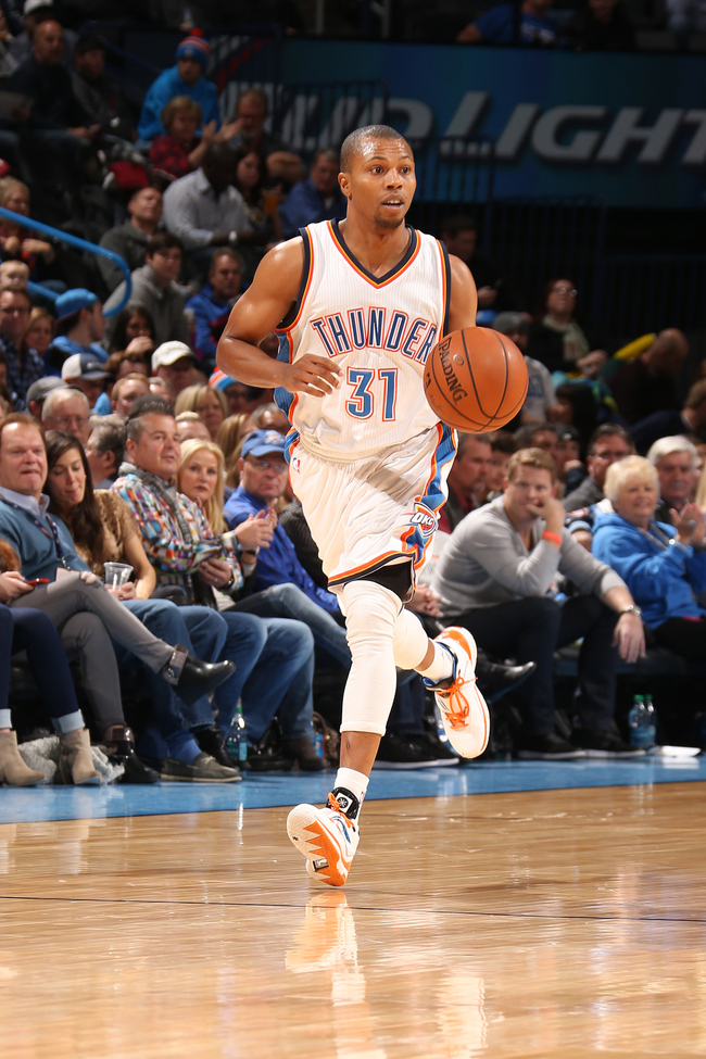 Sebastian Telfair (31) of the Oklahoma City Thunder handles the ball against the Houston Rockets on November 16, 2014 in Oklahoma City, Oklahoma. [File photo: Getty Images via VCG/Layne Murdoch]