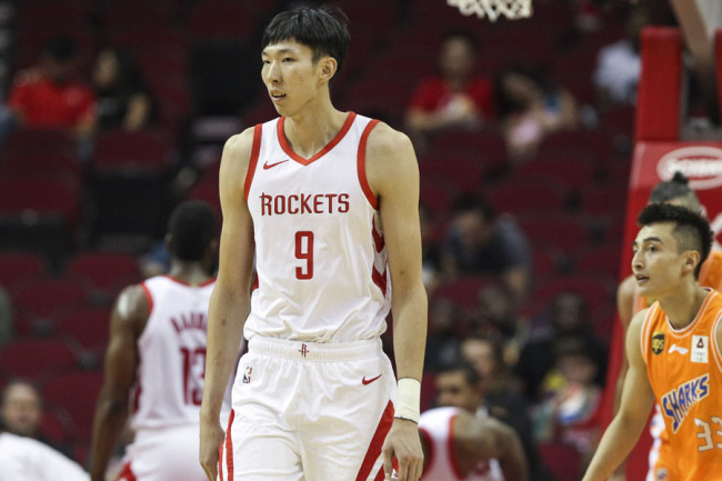 Houston Rockets forward Zhou Qi (9) reacts after a play during the first quarter against the Shanghai Sharks at Toyota Center in Houston on Oct 9, 2018. [File photo: IC]