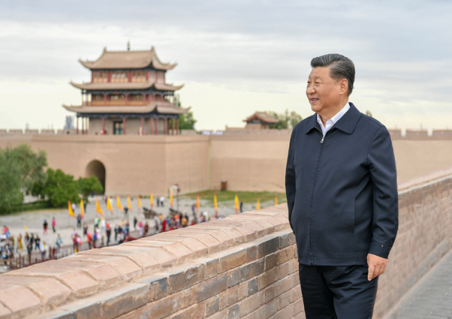 Chinese President Xi Jinping, also general secretary of the Communist Party of China Central Committee and chairman of the Central Military Commission, visits the Jiayu Pass, a famed part of the Great Wall in Jiayuguan City, during his inspection tour of northwest China's Gansu Province, Aug. 20, 2019. [Photo: Xinhua]